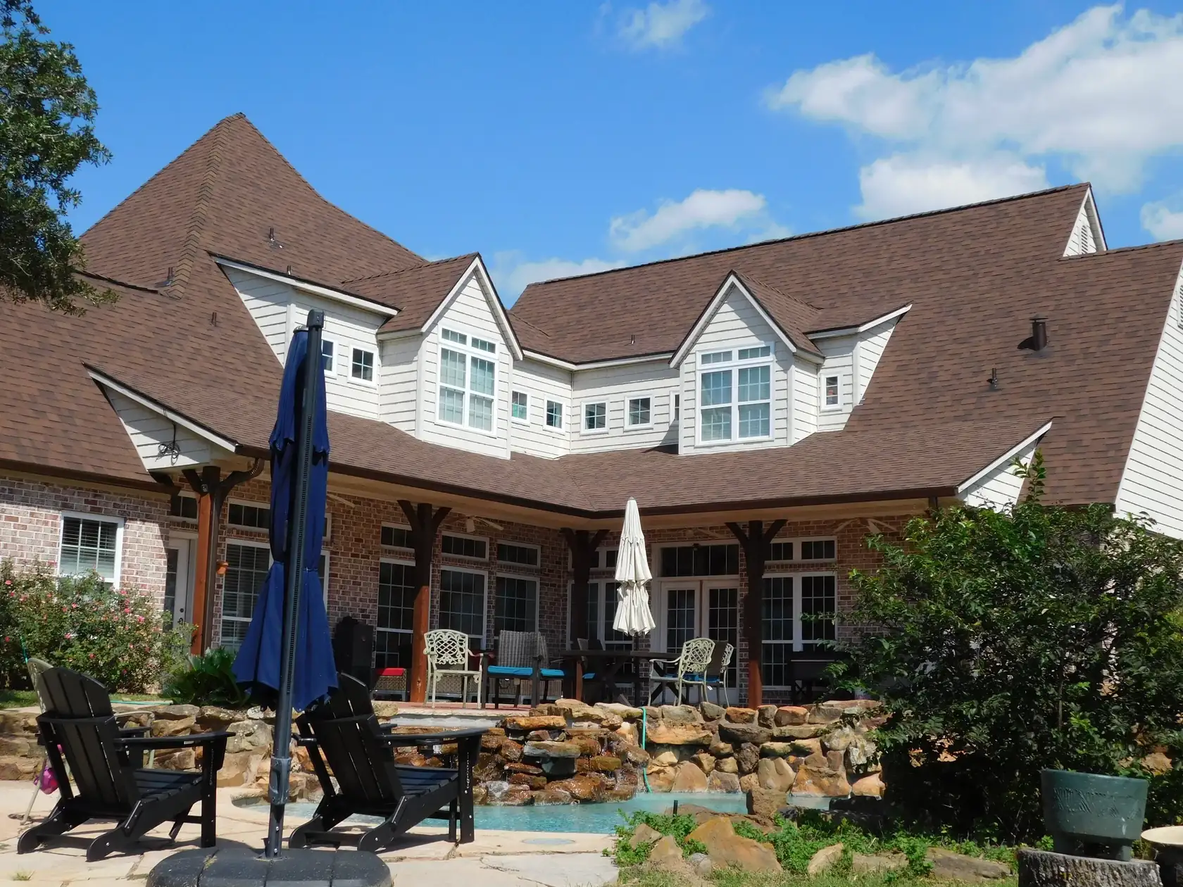 Malarkey Legacy shingle roof in Antique Brown on a two-story home in Canton, installed by Lumley Roofing